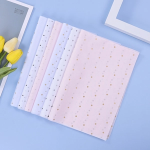 Star and polka dot pattern tissue paper for gift wrapping and flower bouquets