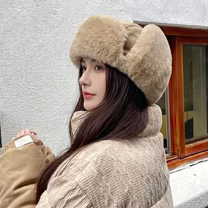 Fleece lined khaki trapper hat for women with plush ear flaps for winter windproof protection