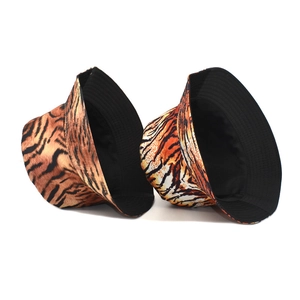 Double-sided bucket hat with classic tiger print pattern and stitched brim for women