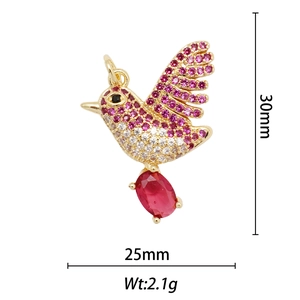 Detail view of bird pendant with red zircon drop and size measurements in 30x25mm