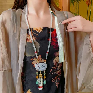 Traditional Chinese style flower glass beaded necklace with blue Ruyi lock tassel pendant