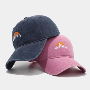 Vintage washed cotton baseball caps with embroidered mountain sunrise design for men and women