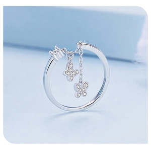Macro shot of S925 sterling silver butterfly charm ring with sparkling zircon detail