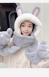 Close-up of rabbit ear hooded scarf with soft grey and white faux fur texture