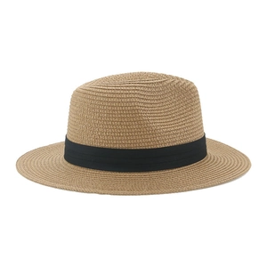 Close-up of beige Panama straw hat showing detailed weave texture and black ribbon band