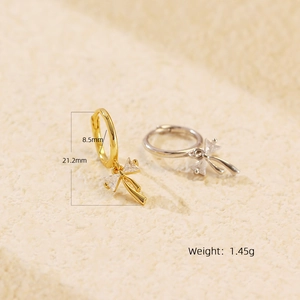 Detailed view of silver bow earrings with zircon drop, measuring 21.2mm in length