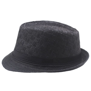 Detailed view of black woven straw fedora hat featuring intricate checkered texture and band