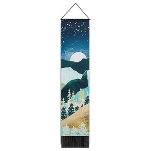 Vertical wall tapestry with golden mountain landscape, wooden hanging rod, and black tassels