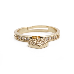 Macro shot of gold adjustable ring featuring a pavé-set crystal heart pendant