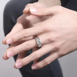 Square cut moissanite ring for men featuring Greek key patterns on silver band