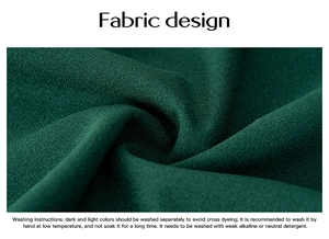 Détails du tissu vert et instructions de lavage pour cette robe à manches bouffantes
