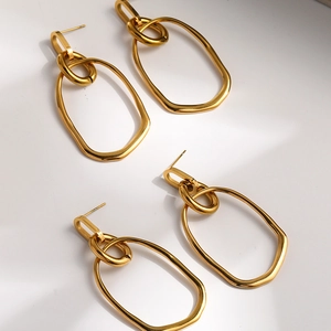 Minimalist gold geometric oval multi-layer drop earrings with a matte metallic finish