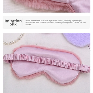 Detail of pink faux silk sleep mask featuring soft plush faux rabbit fur edges