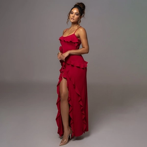 Elegant red backless maxi dress with ruffled layers and a high side slit detail