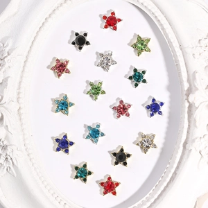 Pentagram star nail art charms set with colorful rhinestones in decorative white frame