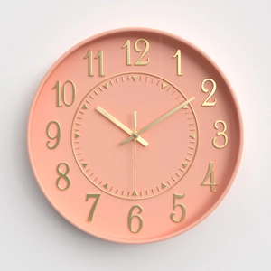 Modern 12-inch coral pink round wall clock with gold 3D numbers for living room decor