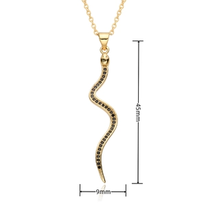 Detail shot of a gold snake pendant with black stones and 45mm by 9mm size dimensions