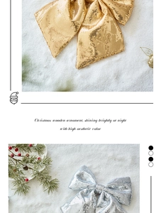 Detail of glitter Christmas bows in gold and silver with sequins and wooden base