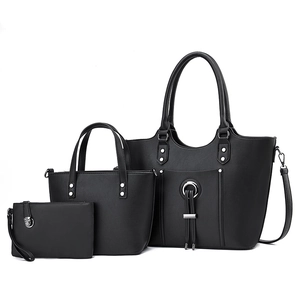 Three-piece black PU leather handbag set including a large tote bag and small clutch bag