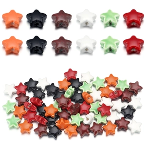 Macro shot of colorful star-shaped ceramic beads for DIY handmade jewelry making