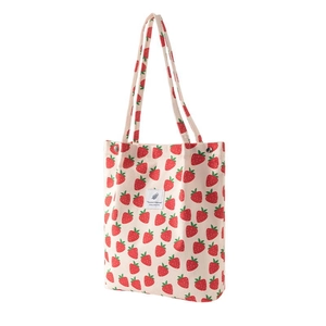 Bolso tote de hombro de pana grande con bonito patrón de fresa roja para uso diario casual.