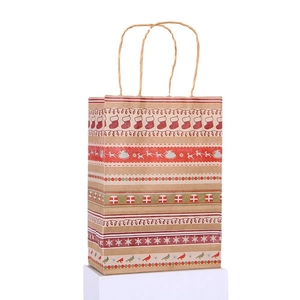 Brown kraft paper Christmas gift bag with reindeer and stocking patterns and hemp handles