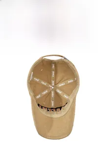 Detail of khaki baseball cap interior showing breathable mesh and FBKS logo sweatband