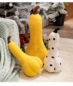 Three-piece set of plush gourd-shaped pillows in yellow and polka dot velvet fabric
