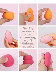 Detail showing the elastic recovery of multi-color non-latex beauty sponges after squeezing