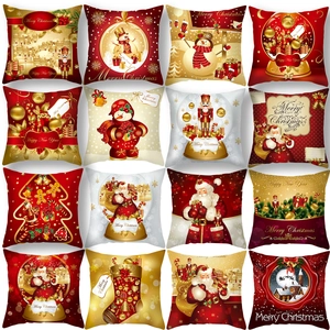 Set of 16 decorative Christmas pillow covers in festive red and gold holiday patterns