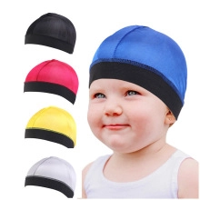 Detailed color selection of baby milk silk durag caps in blue, black, red, and yellow