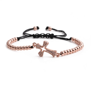 Rose gold cross bracelet with cubic zirconia and black adjustable cord for women