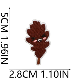 Brown maple leaf embroidery patch with cartoon face and specific size dimensions