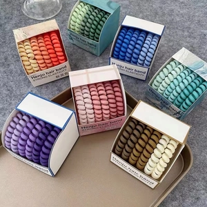 6-piece gradient spiral hair ties set in colorful boxes for traceless ponytail styling