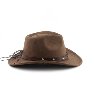 Detail of faux suede cowboy hat featuring leather band with turquoise beads and side tassels