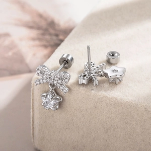 Exquisite bow and star pendant earrings with micro-inlaid zircon in a silver finish