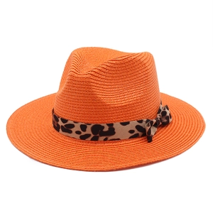 Orange straw Panama hat with leopard print ribbon and bow detail for summer