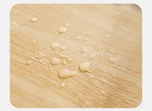 Macro view of waterproof solid wood pet stairs showing hydrophobic surface and texture