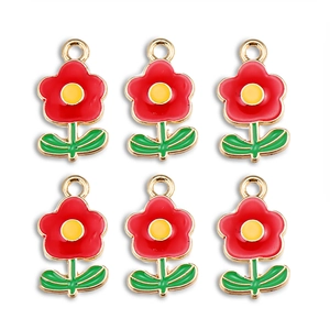 Detail view of six red rose alloy charms with gold edging for DIY jewelry making