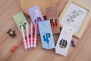 Detailed view of quick-dry gel pens with soft ergonomic grips in assorted pastel colors