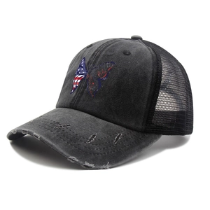 Detailed side view of washed cotton vintage baseball cap with distressed butterfly logo