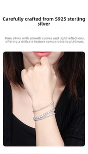 Detail of three-layer S925 sterling silver tennis bracelet with cubic zirconia on wrist