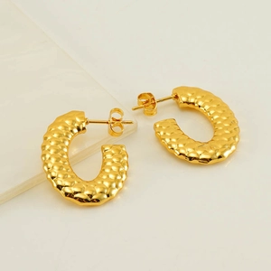 Fashionable C-shaped golden stainless steel earrings with textured hammered finish