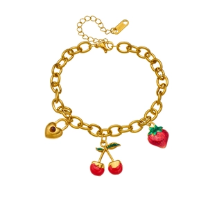 Gold stainless steel chain bracelet featuring strawberry, cherry, and heart enamel charms