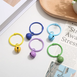 Colorful lacquered metal keychain rings with matching bells in vibrant assorted candy colors