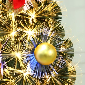 Christmas fiber optic garland with gold ornaments and warm glowing festive lights