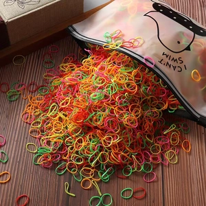 Colorful elastic hair ties for girls in a duck-patterned frosted storage bag
