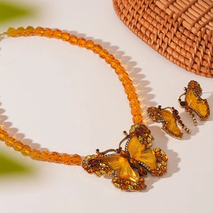 Vintage amber butterfly jewelry set with crystal necklace and matching earrings