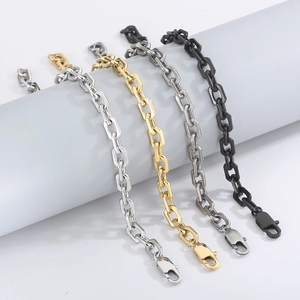 Detail of four stainless steel chain bracelets in silver, gold, gray and black colors