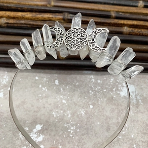 Detailed view of handmade triple moon headband with raw quartz crystals and wire wrapping